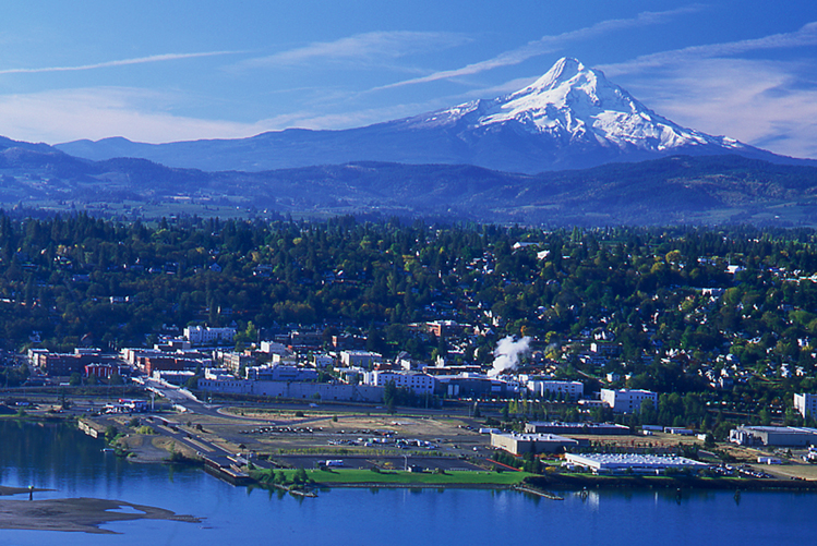 The Washington view looking south across the Columbia River, seeing the City of Hood River with Mt Hood overcasting the Valley.